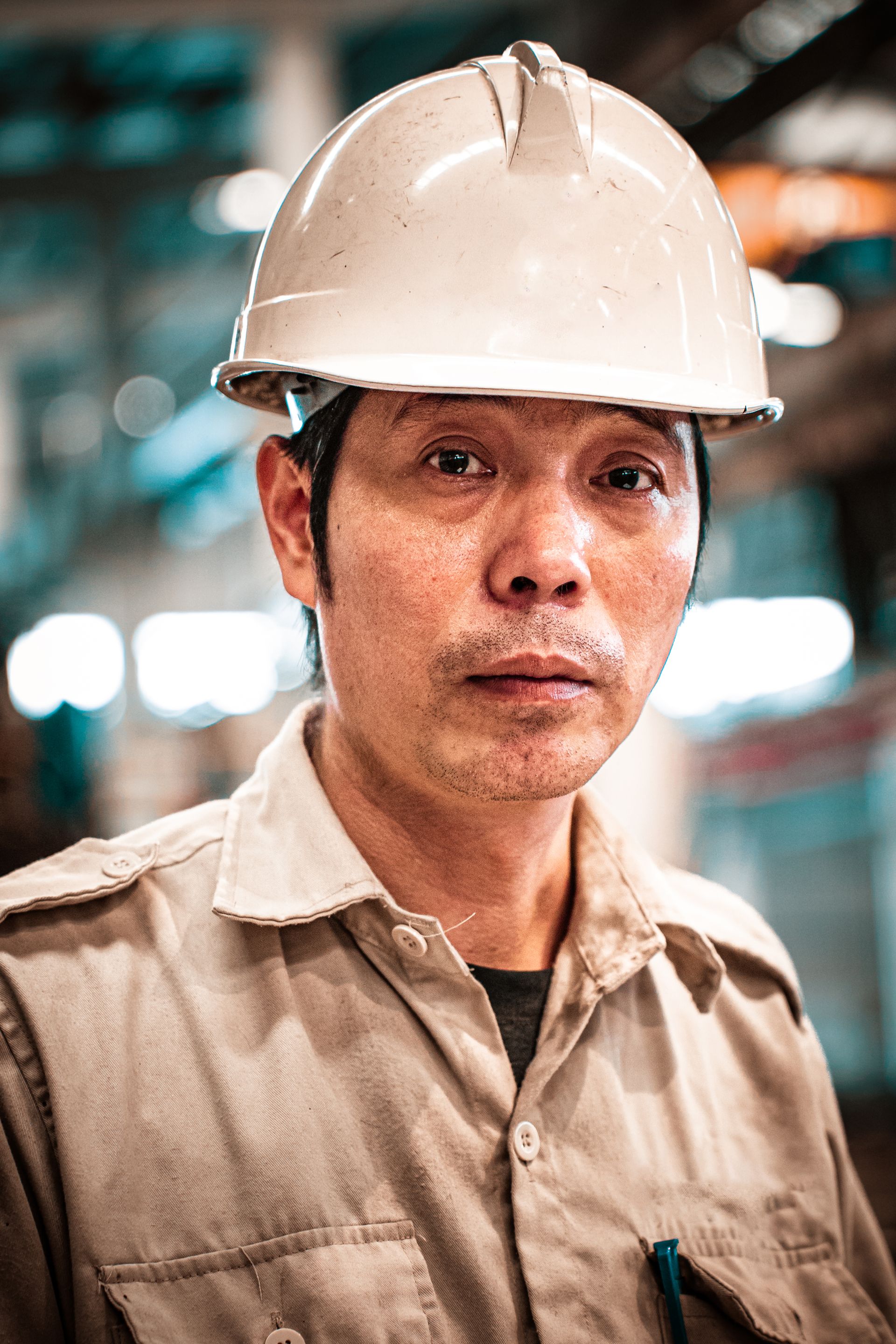 Industrial worker in safety helmet